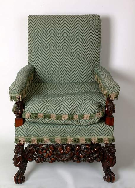 F5. Upholstered armchair